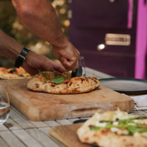 CUTTING PIZZAS WITH CHARLIE IN BEETROOT